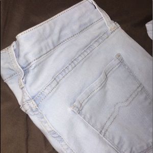 ripped light blue skinny jeans